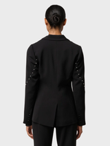 Elegant black blazer by Marcela Pearl, adorned with embellishments, perfect for formal or stylish occasions.