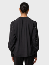 Marcela Pearl's black embellished cupro stretch shirt, designed for comfort and sophistication.