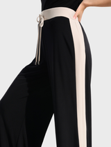 Elegant black pants adorned with moonstone elements, ideal for both professional and casual settings.