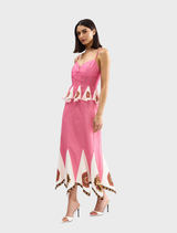 Chic midi skirt in poppy antique hue, designed for comfort and style, ideal for both day and evening events.