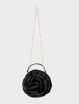 The Rosita Rosette Frame Bag in black, highlighting its sophisticated frame and floral embellishments.