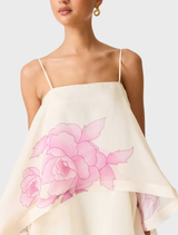 Elegant cream and pink floral tiered gown by Rova, featuring multiple layers and a feminine silhouette.