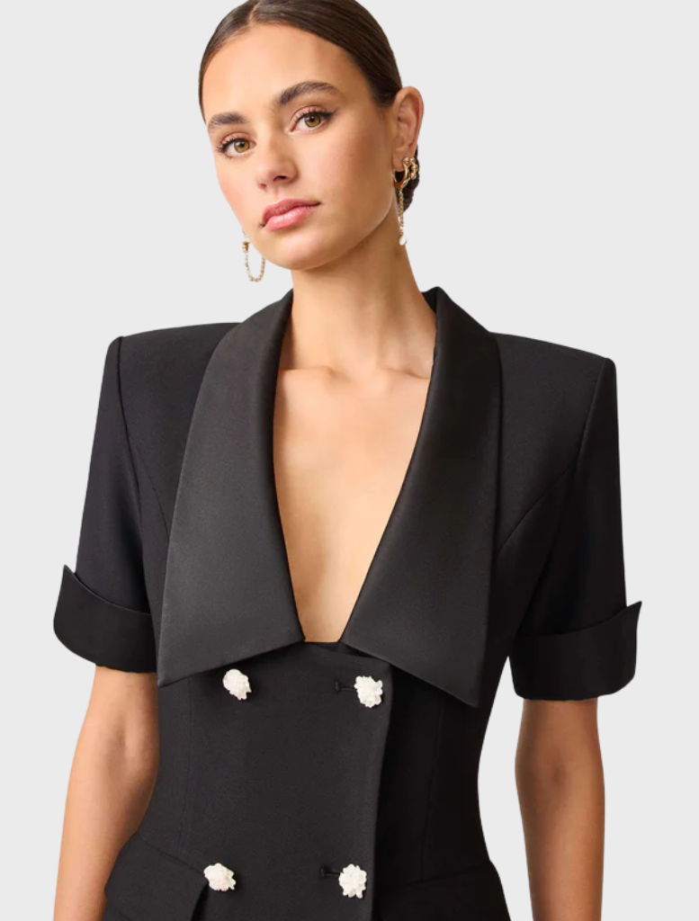  Elegant black blazer dress made from a comfortable wool blend, perfect for formal occasions.