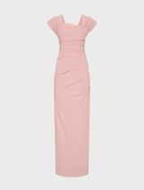 The Salma gown in rosewater showcases a graceful design with a light, airy fabric perfect for formal occasions.