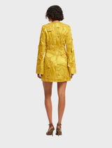 A stylish mini dress with embellished bell sleeves, designed for a sophisticated and glamorous appearance.