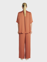 Copper Swish Tux Plaza, featuring a contemporary style with smooth surfaces and refined detailing.