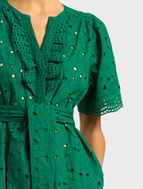 Stunning emerald Voyage Dress, showcasing a graceful cut and vibrant color, suitable for elegant occasions.