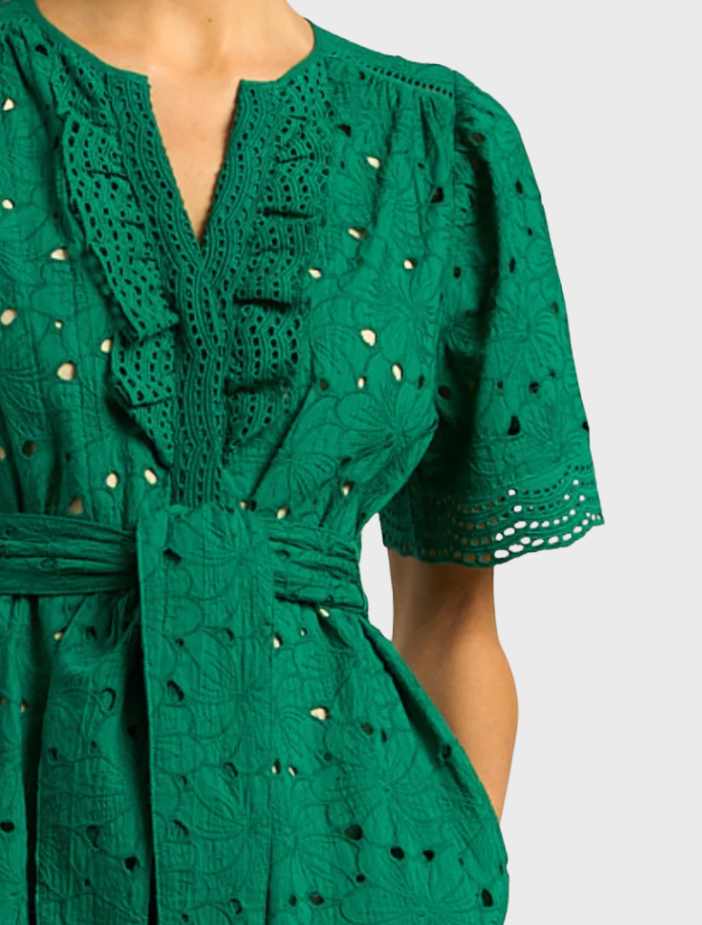 Stunning emerald Voyage Dress, showcasing a graceful cut and vibrant color, suitable for elegant occasions.