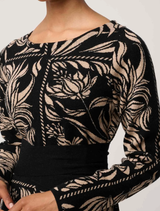 Merino wool blend dress with a floral design, named Flora Deco, perfect for stylish and comfortable wear.