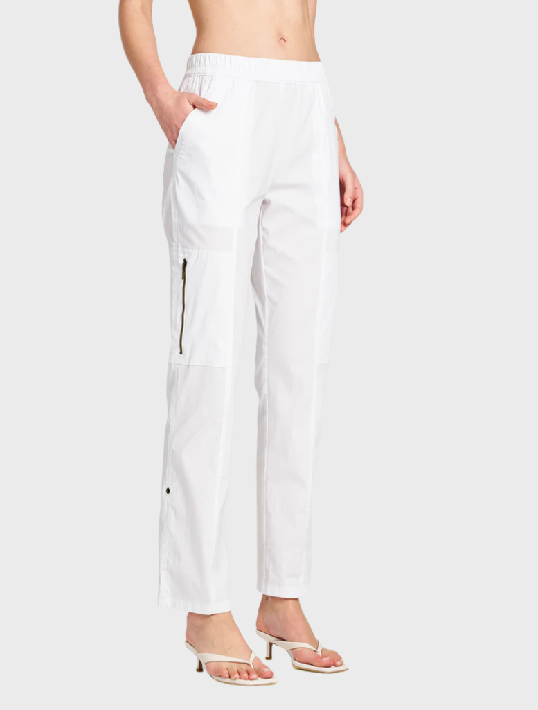 A pair of white Zip Cargo pants laid flat, featuring multiple pockets and a modern cut for casual wear.