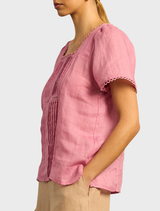 Yonder Top - Floss, a contemporary top with a chic design, suitable for both everyday wear and special events.