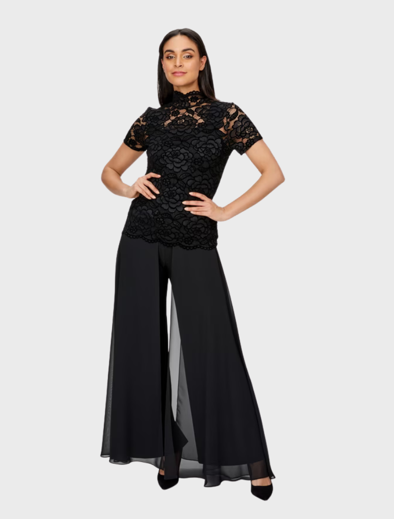 Black woven pants displayed on a neutral background, showcasing a sleek and modern design suitable for various occasions.