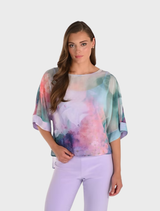 Woven top featuring an aqua and lilac color scheme, showcasing a stylish and lightweight design suitable for casual wear.