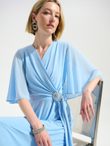 Sky blue wrap midi dress with a V-neckline, showcasing a chic and versatile style suitable for various occasions.