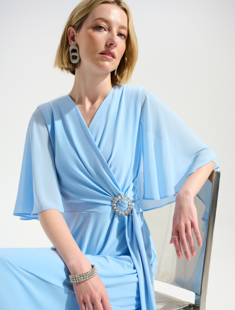 Sky blue wrap midi dress with a V-neckline, showcasing a chic and versatile style suitable for various occasions.