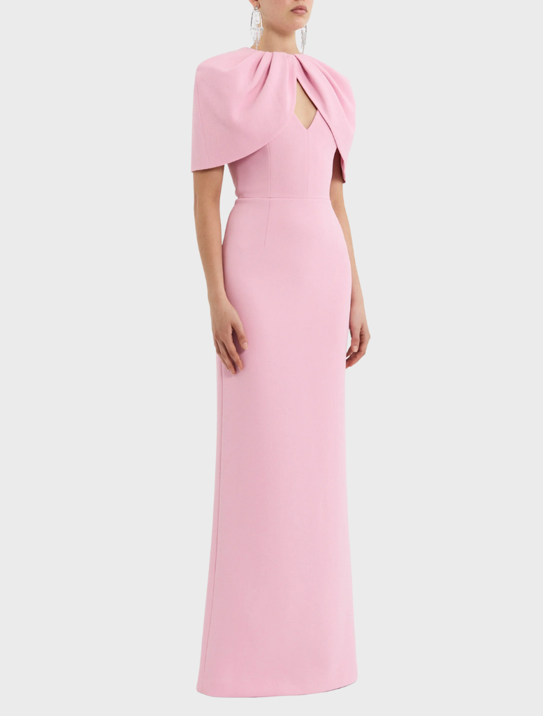 Light pink Xena gown laid flat, highlighting its delicate fabric and sophisticated style.