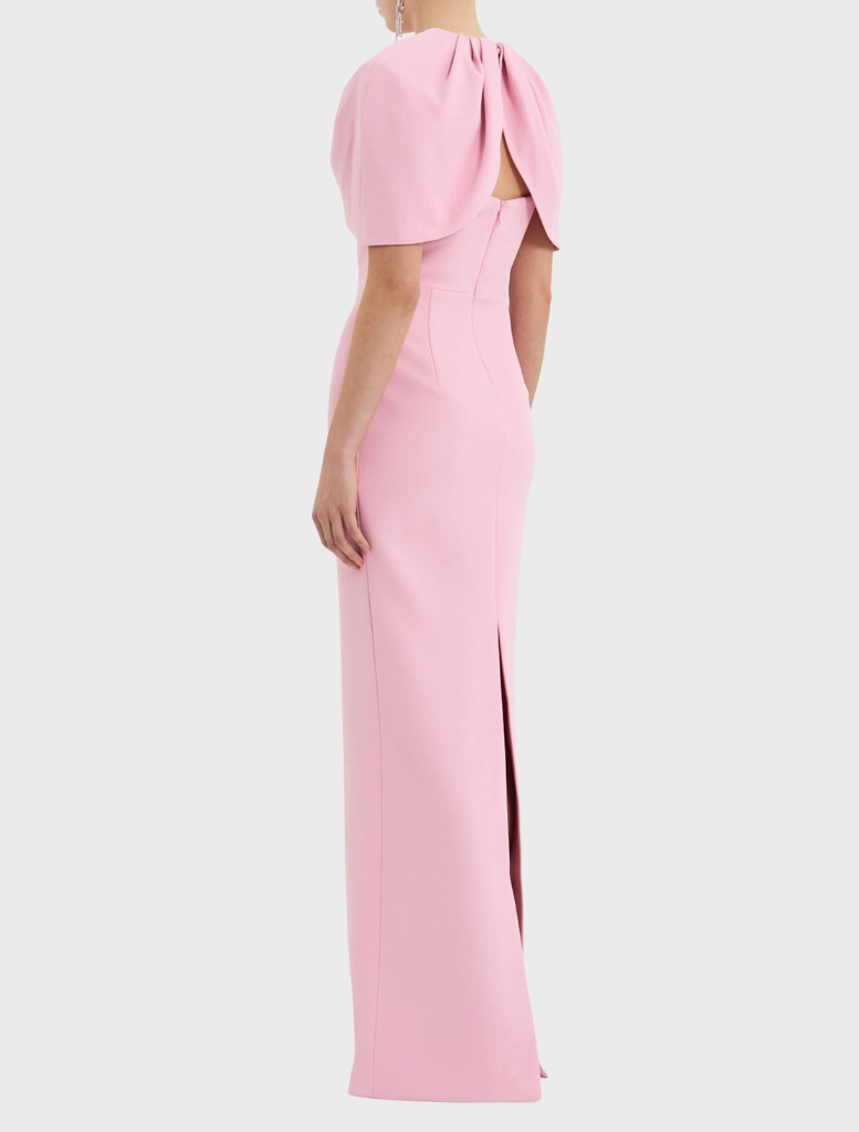 Light pink Xena gown on display, emphasizing its flowing lines and refined elegance.
