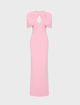 Light pink Xena gown displayed on a mannequin, featuring elegant draping and a flowing silhouette.
