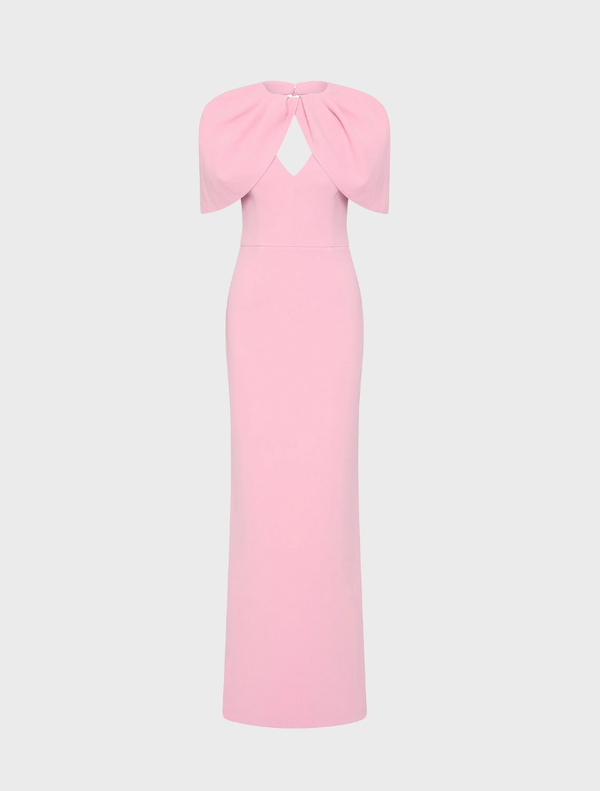 Light pink Xena gown displayed on a mannequin, featuring elegant draping and a flowing silhouette.
