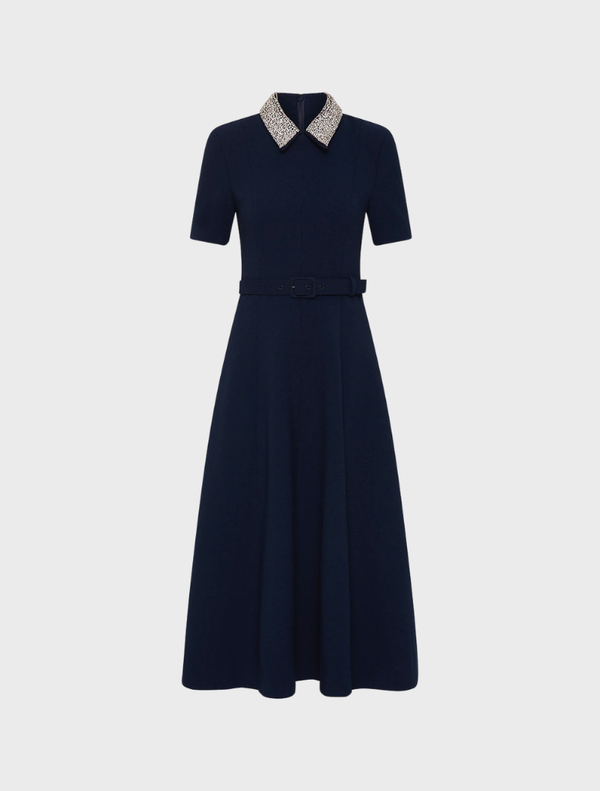 Navy Xena short sleeve midi dress featuring a fitted bodice and flowing skirt, perfect for casual or semi-formal occasions.
