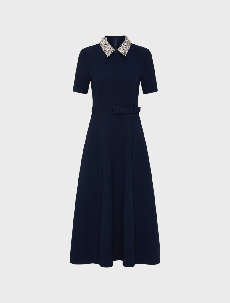 Navy Xena short sleeve midi dress featuring a fitted bodice and flowing skirt, perfect for casual or semi-formal occasions.