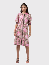 Multi-patterned Yala Dress featuring leopard and floral prints, puff sleeves, fitted waist, and a stand collar.
