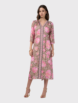 Multi-colored A-line midi dress featuring a gathered skirt, flared sleeves, and contrast details. Fully lined for comfort.