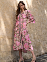 A-line midi dress with gathered skirt, flared sleeves, contrast plackets, and forward shoulder panels. Fully lined.

