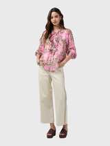 Multi-print Yala Blouse with leopard and floral patterns, ruffle trim, button front, elastic cuffs, and a matching cami included.