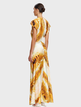 Opal Abstract Yarrow Maxi Dress presents a stylish, long design adorned with a unique, colorful abstract print.