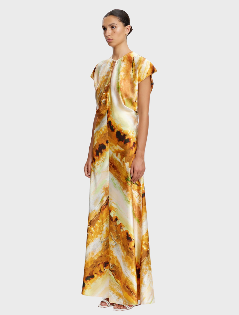 The Yarrow Maxi Dress showcases an Opal Abstract print, characterized by a long, elegant silhouette and artistic patterns.