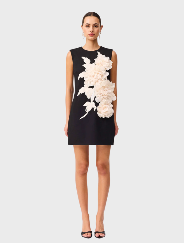  Black Zahara Shift Mini Dress featuring a sleek design and a flattering silhouette for versatile styling options.