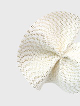 Timeless ivory gold fascinator with a wavy plate style, fitted on a headband, perfect for both extravagant and subtle looks.