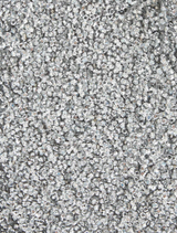 Close-up of a silver Zayn gown, emphasizing the intricate details and shimmering material of the dress.