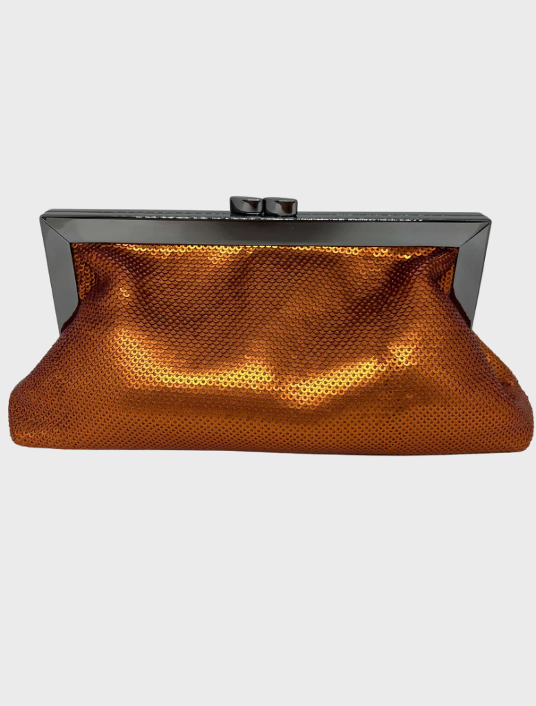  A copper clutch bag featuring a sleek metal clasp, elegantly designed for evening wear.
