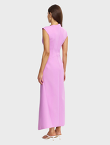 A stylish Burbank Maxi Dress in Zinnia Pink, featuring clean lines and a sculpted silhouette crafted from bonded scuba fabric.