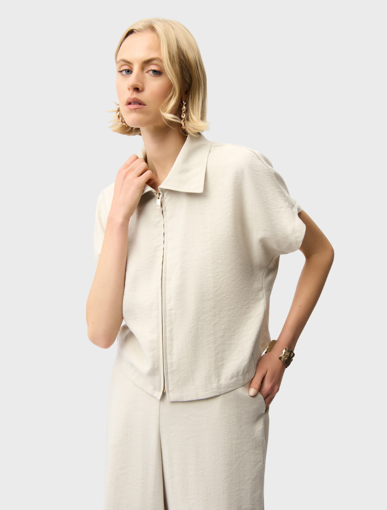 Zipper front jacket in moonstone color, featuring a sleek design and modern silhouette for a stylish look.